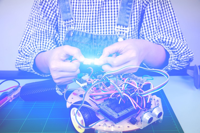 Female student assembly power cable of the robot